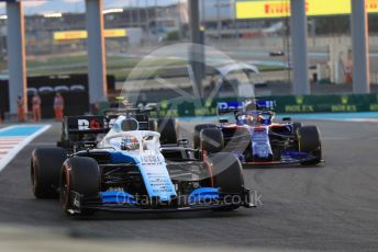 World © Octane Photographic Ltd. Formula 1 – Abu Dhabi GP - Practice 2. Haas F1 Team VF19 – Kevin Magnussen, Scuderia Toro Rosso STR14 – Daniil Kvyat and ROKiT Williams Racing FW 42 – George Russell. Yas Marina Circuit, Abu Dhabi, UAE. Friday 29th November 2019.