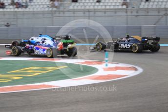World © Octane Photographic Ltd. Formula 1 – Abu Dhabi GP - Practice 2. Haas F1 Team VF19 – Kevin Magnussen, Scuderia Toro Rosso STR14 – Daniil Kvyat and ROKiT Williams Racing FW 42 – George Russell. Yas Marina Circuit, Abu Dhabi, UAE. Friday 29th November 2019.