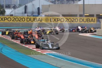 World © Octane Photographic Ltd. Formula 1 – Abu Dhabi GP - Race. Mercedes AMG Petronas Motorsport AMG F1 W10 EQ Power+ - Lewis Hamilton maintains his position as the race starts. Yas Marina Circuit, Abu Dhabi, UAE. Sunday 1st December 2019.