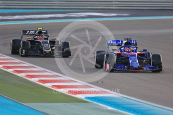 World © Octane Photographic Ltd. Formula 1 – Abu Dhabi GP - Race. Scuderia Toro Rosso STR14 – Daniil Kvyat and Haas F1 Team VF19 – Kevin Magnussen. Yas Marina Circuit, Abu Dhabi, UAE. Sunday 1st December 2019.