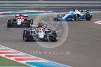 World © Octane Photographic Ltd. Formula 1 – Abu Dhabi GP - Race. Alfa Romeo Racing C38 – Antonio Giovinazzi and Kimi Raikkonen with ROKiT Williams Racing FW 42 – George Russell. Yas Marina Circuit, Abu Dhabi, UAE. Sunday 1st December 2019.