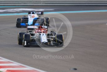 World © Octane Photographic Ltd. Formula 1 – Abu Dhabi GP - Race. Alfa Romeo Racing C38 – Kimi Raikkonen with ROKiT Williams Racing FW 42 – George Russell. Yas Marina Circuit, Abu Dhabi, UAE. Sunday 1st December 2019.