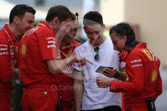World © Octane Photographic Ltd. Formula 1 – Abu Dhabi Pirelli Tyre Test. Scuderia Ferrari – Charles Leclerc shares a laugh with Laurent Mekies – Sporting Director of Scuderia Ferrari and other members of the team. Yas Marina Circuit, Abu Dhabi, UAE. Tuesday 3rd December 2019.