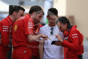 World © Octane Photographic Ltd. Formula 1 – Abu Dhabi Pirelli Tyre Test. Scuderia Ferrari – Charles Leclerc shares a laugh with Laurent Mekies – Sporting Director of Scuderia Ferrari and other members of the team. Yas Marina Circuit, Abu Dhabi, UAE. Tuesday 3rd December 2019.