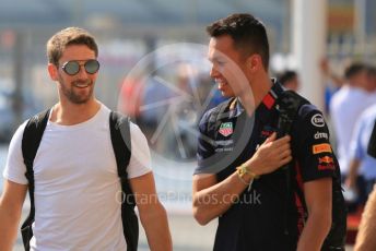 World © Octane Photographic Ltd. Formula 1 – Abu Dhabi GP - Paddock. Aston Martin Red Bull Racing RB15 – Alexander Albon and Haas F1 Team VF19 – Romain Grosjean. Yas Marina Circuit, Abu Dhabi, UAE. Thursday 28th November 2019.