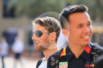 World © Octane Photographic Ltd. Formula 1 – Abu Dhabi GP - Paddock. Aston Martin Red Bull Racing RB15 – Alexander Albon and Haas F1 Team VF19 – Romain Grosjean. Yas Marina Circuit, Abu Dhabi, UAE. Thursday 28th November 2019.