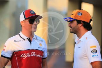 World © Octane Photographic Ltd. Formula 1 – Abu Dhabi GP - Paddock. McLaren MCL34 – Carlos Sainz and Alfa Romeo Racing C38 – Kimi Raikkonen. Yas Marina Circuit, Abu Dhabi, UAE. Thursday 28th November 2019.