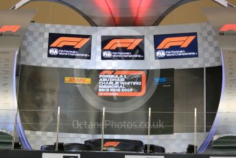 World © Octane Photographic Ltd. Formula 1 – Abu Dhabi GP - Pitlane. Podium decorated for the Charlie Whiting Memorial Bike Ride Yas Marina Circuit, Abu Dhabi, UAE. Thursday 28th November 2019.