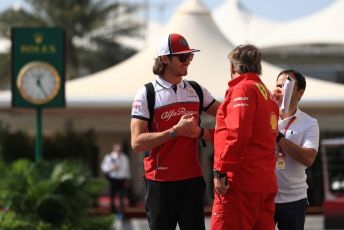 World © Octane Photographic Ltd. Formula 1 – Abu Dhabi GP - Paddock. Alfa Romeo Racing C38 – Antonio Giovinazzi and Gino Rosato – Ferrari Corporate Affairs. Yas Marina Circuit, Abu Dhabi, UAE. Thursday 28th November 2019.