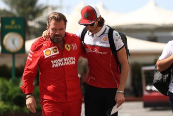 World © Octane Photographic Ltd. Formula 1 – Abu Dhabi GP - Paddock. Alfa Romeo Racing C38 – Antonio Giovinazzi and Gino Rosato – Ferrari Corporate Affairs. Yas Marina Circuit, Abu Dhabi, UAE. Thursday 28th November 2019.