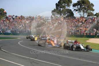 World © Octane Photographic Ltd. Formula 1 – Australian GP Race. Alfa Romeo Racing C38 – Kimi Raikkonen and McLaren MCL34 – Lando Norris. Melbourne, Australia. Sunday 17th March 2019.