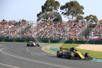 World © Octane Photographic Ltd. Formula 1 – Australian GP Race. Renault Sport F1 Team RS19 – Nico Hulkenberg and Alfa Romeo Racing C38 – Kimi Raikkonen. Melbourne, Australia. Sunday 17th March 2019.