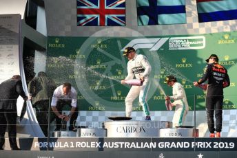 World © Octane Photographic Ltd. Formula 1 – Australian GP Podium. Mercedes AMG Petronas Motorsport AMG F1 W10 EQ Power+ - Valtteri Bottas and Lewis Hamilton and Aston Martin Red Bull Racing RB15 – Max Verstappen. Melbourne, Australia. Sunday 17th March 2019.