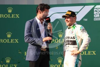 World © Octane Photographic Ltd. Formula 1 – Australian GP Podium. Mercedes AMG Petronas Motorsport AMG F1 W10 EQ Power+ - Valtteri Bottas interviewed by Mark Webber. Melbourne, Australia. Sunday 17th March 2019.