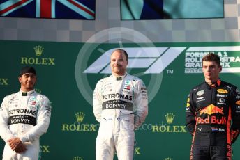 World © Octane Photographic Ltd. Formula 1 – Australian GP Podium. Mercedes AMG Petronas Motorsport AMG F1 W10 EQ Power+ - Valtteri Bottas and Lewis Hamilton and Aston Martin Red Bull Racing RB15 – Max Verstappen. Melbourne, Australia. Sunday 17th March 2019.