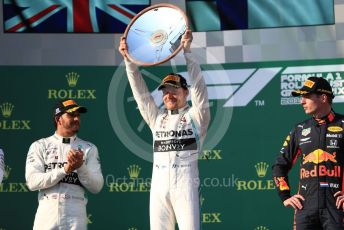 World © Octane Photographic Ltd. Formula 1 – Australian GP Podium. Mercedes AMG Petronas Motorsport AMG F1 W10 EQ Power+ - Valtteri Bottas and Lewis Hamilton and Aston Martin Red Bull Racing RB15 – Max Verstappen. Melbourne, Australia. Sunday 17th March 2019.