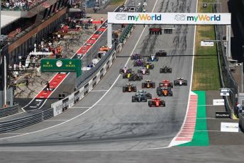 World © Octane Photographic Ltd. Formula 1 – Austrian GP - Race. Scuderia Ferrari SF90 – Charles Leclerc leads race start while Mercedes AMG Petronas Motorsport AMG F1 W10 EQ Power+ - Lewis Hamilton makes a bold move up the inside. Red Bull Ring, Spielberg, Styria, Austria. Sunday 30th June 2019