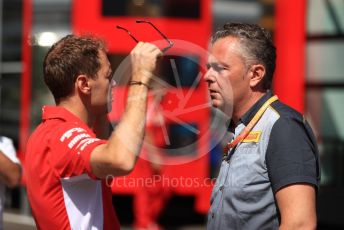 World © Octane Photographic Ltd. Formula 1 – Austrian GP - Paddock. Scuderia Ferrari SF90 – Sebastian Vettel chats with Mario Isola – Pirelli Head of Car Racing . Red Bull Ring, Spielberg, Styria, Austria. Thursday 27th June 2019