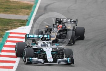 World © Octane Photographic Ltd. Formula 1 – Winter Testing - Test 1 - Day 3. Mercedes AMG Petronas Motorsport AMG F1 W10 EQ Power+ - Valtteri Bottas and Rich Energy Haas F1 Team VF19 – Pietro Fittipaldi. Circuit de Barcelona-Catalunya. Wednesday 20th February 2019.