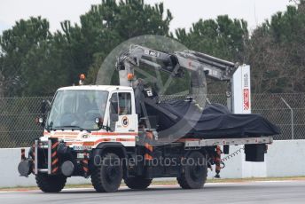 World © Octane Photographic Ltd. Formula 1 – Winter Testing - Test 1 - Day 3. Rich Energy Haas F1 Team VF19 – Pietro Fittipaldi car gets returned to pit lane on a truck. Circuit de Barcelona-Catalunya. Wednesday 20th February 2019.