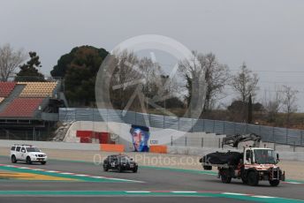 World © Octane Photographic Ltd. Formula 1 – Winter Testing - Test 1 - Day 3. Rich Energy Haas F1 Team VF19 – Pietro Fittipaldi car gets returned to pit lane on a truck. Circuit de Barcelona-Catalunya. Wednesday 20th February 2019.