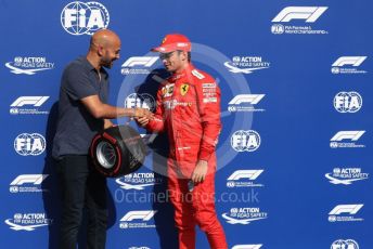 World © Octane Photographic Ltd. Formula 1 – Belgium GP - Qualifying. Scuderia Ferrari SF90 – Charles Leclerc receives the Pirelli Pole Position Award from the Pirelli Representative, actor Keegan-Micheal Key.  Circuit de Spa Francorchamps, Belgium. Saturday 31st August 2019.