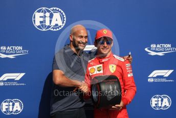 World © Octane Photographic Ltd. Formula 1 – Belgium GP - Qualifying. Scuderia Ferrari SF90 – Charles Leclerc receives the Pirelli Pole Position Award from the Pirelli Representative, actor Keegan-Micheal Key.  Circuit de Spa Francorchamps, Belgium. Saturday 31st August 2019.