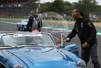 World © Octane Photographic Ltd. Formula 1 – British GP - Drivers Parade. Mercedes AMG Petronas Motorsport AMG F1 W10 EQ Power+ - Lewis Hamilton and Nic Hamilton. Silverstone Circuit, Towcester, Northamptonshire. Sunday 14th July 2019.