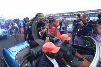 World © Octane Photographic Ltd. Formula 1 – British GP - Drivers Parade. Mercedes AMG Petronas Motorsport AMG F1 W10 EQ Power+ - Lewis Hamilton, Antony Hamilton and Nic Hamilton. Silverstone Circuit, Towcester, Northamptonshire. Sunday 14th July 2019.
