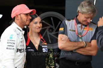 World © Octane Photographic Ltd. Formula 1 – British GP - Qualifying. Mercedes AMG Petronas Motorsport AMG F1 W10 EQ Power+ - Lewis Hamilton and Pirelli Representative, pop star Mabel McVey. Silverstone Circuit, Towcester, Northamptonshire. Saturday 13th July 2019.