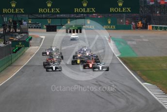 World © Octane Photographic Ltd. Formula 1 – British GP - Race. Mercedes AMG Petronas Motorsport AMG F1 W10 EQ Power+ - Valtteri Bottas leads the race start. Silverstone Circuit, Towcester, Northamptonshire. Sunday 14th July 2019.
