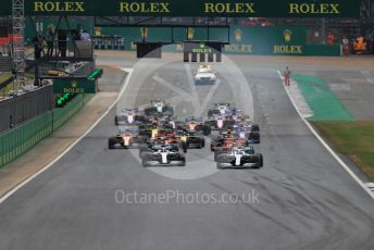 World © Octane Photographic Ltd. Formula 1 – British GP - Race. Mercedes AMG Petronas Motorsport AMG F1 W10 EQ Power+ - Valtteri Bottas leads the race start. Silverstone Circuit, Towcester, Northamptonshire. Sunday 14th July 2019.