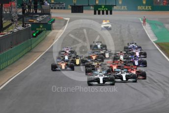 World © Octane Photographic Ltd. Formula 1 – British GP - Race. Mercedes AMG Petronas Motorsport AMG F1 W10 EQ Power+ - Valtteri Bottas leads the race start. Silverstone Circuit, Towcester, Northamptonshire. Sunday 14th July 2019.