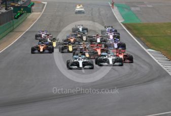 World © Octane Photographic Ltd. Formula 1 – British GP - Race. Mercedes AMG Petronas Motorsport AMG F1 W10 EQ Power+ - Valtteri Bottas leads the race start. Silverstone Circuit, Towcester, Northamptonshire. Sunday 14th July 2019.