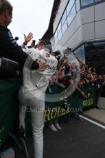 World © Octane Photographic Ltd. Formula 1 – British GP - Race - Podium. Mercedes AMG Petronas Motorsport AMG F1 W10 EQ Power+ - Lewis Hamilton. Silverstone Circuit, Towcester, Northamptonshire. Sunday 14th July 2019.
