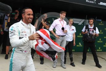 World © Octane Photographic Ltd. Formula 1 – British GP - Race - Podium. Mercedes AMG Petronas Motorsport AMG F1 W10 EQ Power+ - Lewis Hamilton. Silverstone Circuit, Towcester, Northamptonshire. Sunday 14th July 2019.