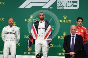 World © Octane Photographic Ltd. Formula 1 – British GP - Race - Podium. Mercedes AMG Petronas Motorsport AMG F1 W10 EQ Power+ - Lewis Hamilton, Valtteri Bottas and Scuderia Ferrari SF90 – Charles Leclerc. Silverstone Circuit, Towcester, Northamptonshire. Sunday 14th July 2019.