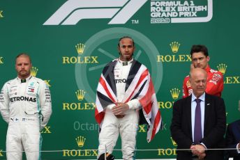 World © Octane Photographic Ltd. Formula 1 – British GP - Race - Podium. Mercedes AMG Petronas Motorsport AMG F1 W10 EQ Power+ - Lewis Hamilton, Valtteri Bottas and Scuderia Ferrari SF90 – Charles Leclerc. Silverstone Circuit, Towcester, Northamptonshire. Sunday 14th July 2019.
