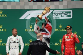 World © Octane Photographic Ltd. Formula 1 – British GP - Race - Podium. Mercedes AMG Petronas Motorsport AMG F1 W10 EQ Power+ - Lewis Hamilton, Valtteri Bottas and Scuderia Ferrari SF90 – Charles Leclerc. Silverstone Circuit, Towcester, Northamptonshire. Sunday 14th July 2019.