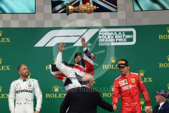 World © Octane Photographic Ltd. Formula 1 – British GP - Race - Podium. Mercedes AMG Petronas Motorsport AMG F1 W10 EQ Power+ - Lewis Hamilton, Valtteri Bottas and Scuderia Ferrari SF90 – Charles Leclerc. Silverstone Circuit, Towcester, Northamptonshire. Sunday 14th July 2019.