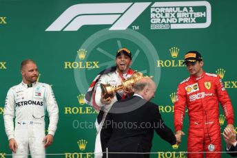 World © Octane Photographic Ltd. Formula 1 – British GP - Race - Podium. Mercedes AMG Petronas Motorsport AMG F1 W10 EQ Power+ - Lewis Hamilton, Valtteri Bottas and Scuderia Ferrari SF90 – Charles Leclerc. Silverstone Circuit, Towcester, Northamptonshire. Sunday 14th July 2019.