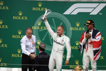 World © Octane Photographic Ltd. Formula 1 – British GP - Race - Podium. Mercedes AMG Petronas Motorsport AMG F1 W10 EQ Power+ - Lewis Hamilton and Valtteri Bottas. Silverstone Circuit, Towcester, Northamptonshire. Sunday 14th July 2019.