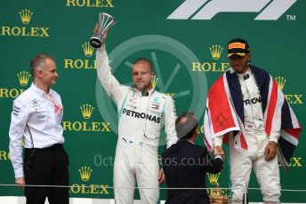 World © Octane Photographic Ltd. Formula 1 – British GP - Race - Podium. Mercedes AMG Petronas Motorsport AMG F1 W10 EQ Power+ - Lewis Hamilton and Valtteri Bottas. Silverstone Circuit, Towcester, Northamptonshire. Sunday 14th July 2019.