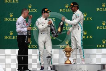 World © Octane Photographic Ltd. Formula 1 – British GP - Race - Podium. Mercedes AMG Petronas Motorsport AMG F1 W10 EQ Power+ - Lewis Hamilton and Valtteri Bottas. Silverstone Circuit, Towcester, Northamptonshire. Sunday 14th July 2019.