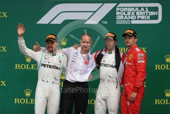 World © Octane Photographic Ltd. Formula 1 – British GP - Race - Podium. Mercedes AMG Petronas Motorsport AMG F1 W10 EQ Power+ - Lewis Hamilton, Valtteri Bottas and Scuderia Ferrari SF90 – Charles Leclerc. Silverstone Circuit, Towcester, Northamptonshire. Sunday 14th July 2019.