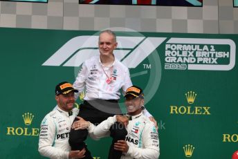 World © Octane Photographic Ltd. Formula 1 – British GP - Race - Podium. Mercedes AMG Petronas Motorsport AMG F1 W10 EQ Power+ - Lewis Hamilton and Valtteri Bottas. Silverstone Circuit, Towcester, Northamptonshire. Sunday 14th July 2019.