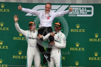 World © Octane Photographic Ltd. Formula 1 – British GP - Race - Podium. Mercedes AMG Petronas Motorsport AMG F1 W10 EQ Power+ - Lewis Hamilton and Valtteri Bottas. Silverstone Circuit, Towcester, Northamptonshire. Sunday 14th July 2019.