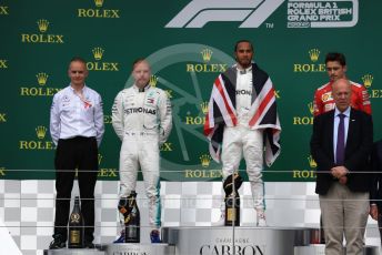 World © Octane Photographic Ltd. Formula 1 – British GP - Race - Podium. Mercedes AMG Petronas Motorsport AMG F1 W10 EQ Power+ - Lewis Hamilton, Valtteri Bottas and Scuderia Ferrari SF90 – Charles Leclerc. Silverstone Circuit, Towcester, Northamptonshire. Sunday 14th July 2019.