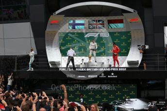 World © Octane Photographic Ltd. Formula 1 – British GP - Race - Podium. Mercedes AMG Petronas Motorsport AMG F1 W10 EQ Power+ - Lewis Hamilton, Valtteri Bottas and Scuderia Ferrari SF90 – Charles Leclerc. Silverstone Circuit, Towcester, Northamptonshire. Sunday 14th July 2019.