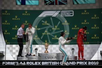 World © Octane Photographic Ltd. Formula 1 – British GP - Race - Podium. Mercedes AMG Petronas Motorsport AMG F1 W10 EQ Power+ - Lewis Hamilton, Valtteri Bottas and Scuderia Ferrari SF90 – Charles Leclerc. Silverstone Circuit, Towcester, Northamptonshire. Sunday 14th July 2019.